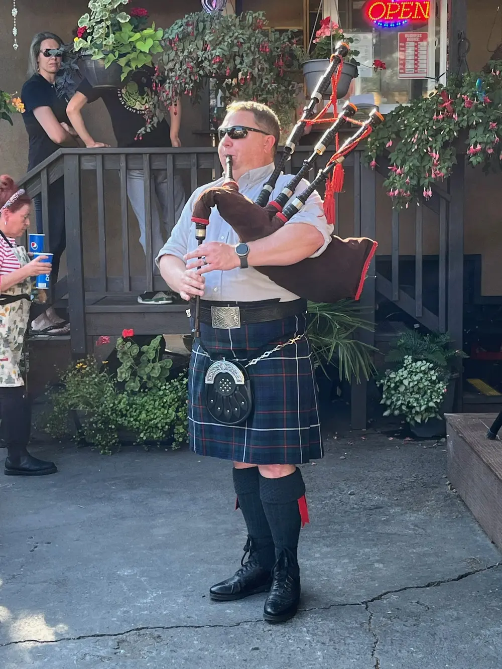 man in a kilt playing pipes