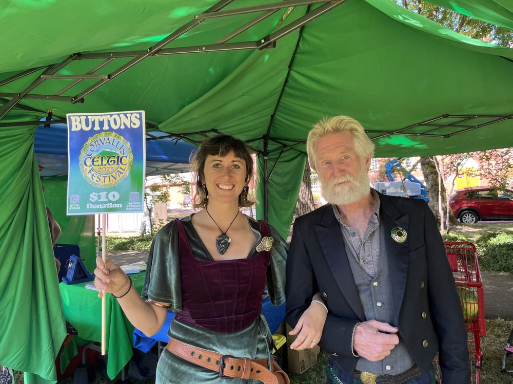 two people selling buttons